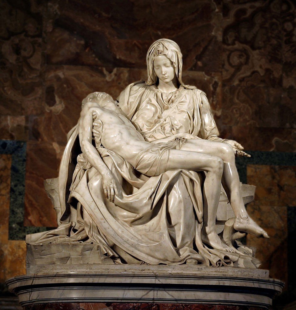 Piedade (Pietà). Basílica de São Pedro, Vaticano. Roma. Sua primeira obra-prima, finalizada em 1499, quando o rapaz tinha apenas 23 aninhos.